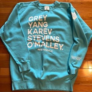 Women’s Medium Jadelynn Brooks sweatshirt. Color is teal.